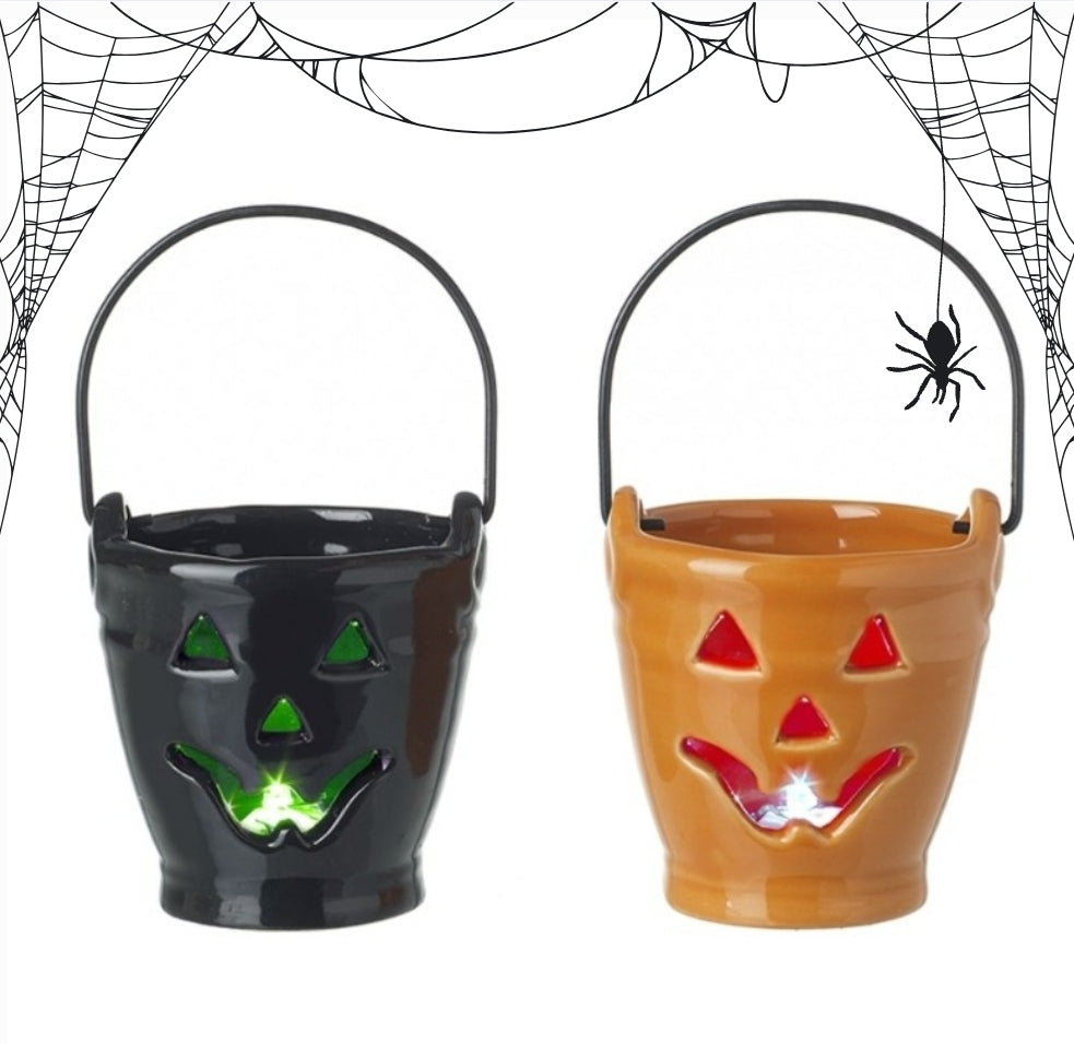 Cute little light up ceramic pumpkin buckets. Halloween bucket